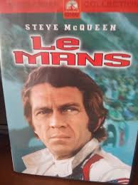 Great main photo for this site. Thanks for posting it Yep that's me with my  back to camera in the blue Nomex white helmet with stripe running across  the road to jump