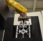 Robotic Die Cast Tending System is Portable, Versatile and Compact -  Durabotics