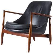 This distinctive danish modern design features a solid walnut wood frame with. Ib Kofod Larsen Elizabeth Chair At 1stdibs
