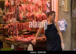 Butcher in Stanley Market, Stanley, Hong Kong Island, Hong Kong Stock Photo 