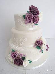 Beautiful White Lace Wedding Cake Decorations Combined With Lovely Purple Roses Wedding Cake De Wedding Cake Decorations Wedding Cake Roses Wedding Cake Recipe