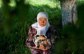 Relatives inspect coffins prepared for burial, in potocari near srebrenica, bosnia, wednesday, july 10, 2019. 20 Years Since The Srebrenica Massacre The Atlantic