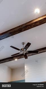 You can buy $17 lights and $20 trims. Vertical Ceiling Fan Image Photo Free Trial Bigstock