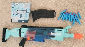 Nerf blasters don't really need a suppressor so this suppressor barrel can be easily detached. Nerf S Fortnite Rippley Line Is Kid Approved Fun Geekmom