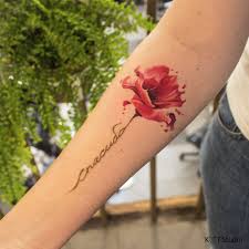 With Izayah Grace On The Stem Mom Tattoos Poppies Tattoo Body Art Tattoos