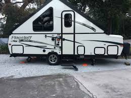 When you combine the solid exterior of a travel trailer with a tent camper, you get the flagstaff hard side series, giving your camping experience the best. 2017 Used Forest River Flagstaff T21tbhw Pop Up Camper In Florida Fl