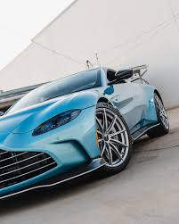 Image result for Caribbean Blue 2023 Aston Martin