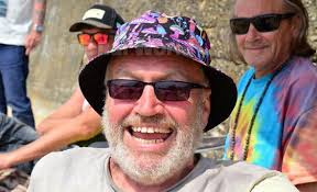 39728194-Shirt off the sun is out. Danny Hill with Ebony Gardner in the  heat of the sun at the Headland Fish Sands. Picture by FRANK REID