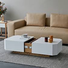 We offer a wide variety of coffee tables to meet your living room needs. White Natural White Black Extendable Coffee Table With Hidden Storage Sliding Top Coffee Table Manufactured Wood In 2021 Extendable Coffee Table Modern Coffee Table Decor Coffee Table Storage Modern