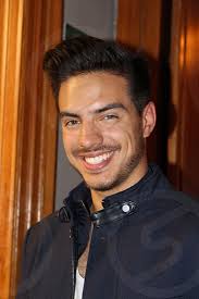 This is Vadhir Derbez, son of Eugenio Derbez. The photo was taken in a  press conference because of his new movie "El tamaño sí importa"  by alejandra Andraca. Photo stock