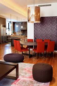 A over sized hand crafted wicker pendant shade sits above the dining table. Chandelier Above Dining Table Houzz