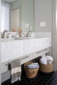 Featuring benjamin moore's moonshine pale gray shade, this spacious bathroom by soucie horner uses layers of white and gray to keep the decor classic, timeless, and traditional. Marble Bathrooms We Re Swooning Over Hgtv S Decorating Design Blog Hgtv
