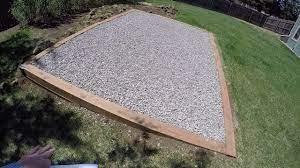 Asphalt may compress unlike gravel, which once leveled, should remain solid for a shed foundation. Gravel Pad For Shed Youtube