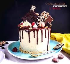 Drip Cake Chocolat Framboise Et Cacahuete Cake Chocolat Drip Cakes Recette Cake Design