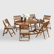 Oval Wood Lira 7 Piece Folding Dining Set World Market In 2020 Outdoor Dining Furniture Dining Furniture Patio Dining