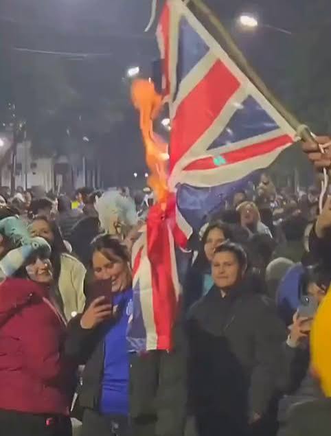 Shocking moment Argentina fans BURN Union Jacks in the street as World Cup semi final tensions reach fever pitch