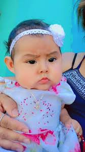 My baby got out last night her name is culture she's still a baby and she's  scared please help me find her she's gray with black stripes. She has a  rose gold