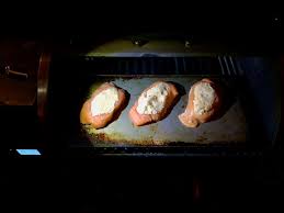 Brush remaining olive oil onto salmon; Crabmeat Stuffed Salmon On The Grate Griddle Grillgrate