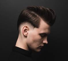 Man with low taper fade on curly hair credit: 12 Low Fade Haircuts For Stylish Guys 2020 By Muhammad Roman Medium