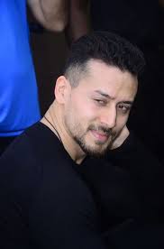 Tiger Shroff Curly Hair Slicked back hair continues to be one of the most popular men's hairstyles. tiger shroff curly hair