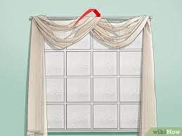 Choose a swag valance that's just right for your kitchen, bathroom, dining area, or living room. 3 Ways To Drape Window Scarves Wikihow