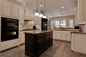 Black Appliances Cream Cabinets And A Black Island I Love Black Appliances Kitchen Brown Kitchen Cabinets Brown Kitchens
