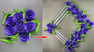 Cut them so you have 18 pieces of paper. Paper Flower Wall Hanging Diy Hanging Flower Wall Decoration Ideas Paper Flower Wall Decor Paper Flowers Hanging Flower Wall