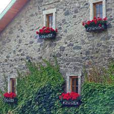 Treasure a bit of antiquated charm with wrought iron planters in classic designs. Wrought Iron Window Boxes Self Watering Custom Flower Boxes