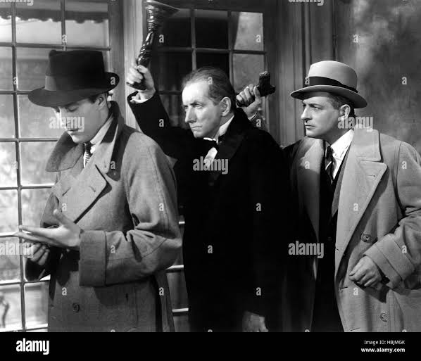 BULLDOG DRUMMOND ESCAPES, Ray Milland, Reginald Denny, 1937 Stock Photo -  Alamy