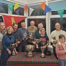 Prizewinners collect their trophies at Annandale Sailing Club's prizegiving 