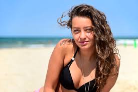 Brunettes work wonderfully in tandem with both highlights and lowlights which also offer greater options for seasonal. Portrait Of Smiling Teenage Girl With Brown Hair On The Beach Stockphoto