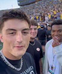 National Champions Colston Loveland, Mason Graham & Will Johnson