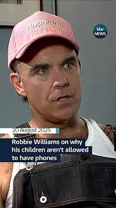 📱✨ Robbie Williams has shared why he won't let his children have phones