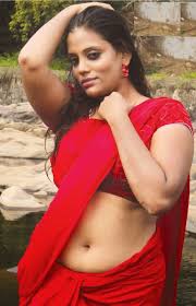 Not only me… even any man gets attracted to a saree navel… since the complete curves of a female are unleashed more in saree than any other dress….since some jeans/shorts make hips little compressed where as saree shows us the shapes of those hips. Masala Actress Mumtaj Hot Navel Show In Saree Blouse Photos Indian Actress