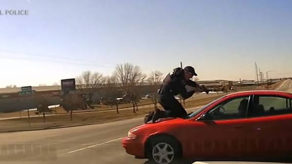 Stop the car!': BWC shows Iowa officer clinging to roof of suspect's car