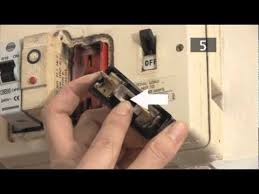 If an automatic fuse blows, the fuse box switch will change position. How To Change A Fuse In A Traditional Fuse Box Youtube