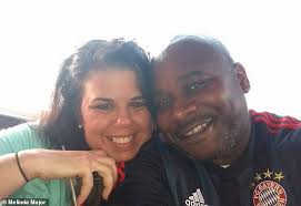 Woman wakes up in her Memphis hotel room to find a SNAKE wrapped round her  arm