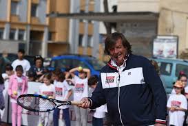 Considerato il miglior giocatore italiano dell'era open e uno dei più grandi di sempre, nel suo palmarès figurano 10 tornei del circuito maggiore in singolare su 26 finali disputate, oltre a 18 titoli in doppio su 28 finali disputate. Adriano Panatta At The Un Campione Per Amico Event In Rome
