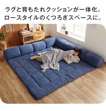 ラグと背もたれクッションが一体化 ロースタイルのくつろぎスペースに フロアマットレス ミニマリストの家具 ベッドルームのデザイン