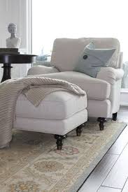 An ottoman allows you to really put your feet up and can add another level of comfort to a chair or couch. Barrie Residence Living Room Chairs Furniture Home