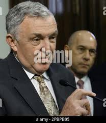 Rep. Jerry Madden, R-Richardson, left, prepares to speak during a news  conference Wednesday, March 28, 2007, in Austin, Texas, after Gov. Perry  announced that Jay Kimbrough will serve as the conservator of