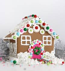 Transfer into separate piping bags and use to decorate excess gingerbread shapes. Sprinkle Gingerbread House Tutorial