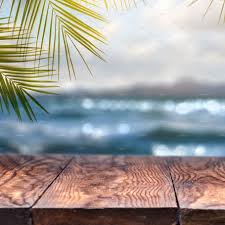 Beach wood table foldable height 24 length 26 outdoor usable. Old Wood Table Top On Blurred Beach Background With Coconut Leaf High Quality Nature Stock Photos Creative Market