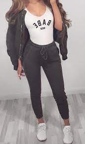 Winter Outfits Women S White And Black Babe Tank Top Black Zip Up Jacket Black Drawstring Pants And Pair Of Whit Fashion Outfits Invierno Beautiful Outfits