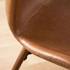Regardless of whether you have brown faux leather dining chairs, black faux leather dining chairs, or grey faux leather bar stools, mild is the order of direct sunlight can dry out faux leathers. Uma Faux Leather Dining Chair Set Of 2