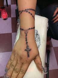Search on info.com for rosary on arm tattoos. A Fun Rosary From Over The Weekend Traepereztattoos Wrist Tattoos For Women Rosary Tattoo Finger Tattoos