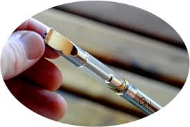 You put 2ml of liquidizer and one 1 gram of wax in a shot glass. Filling Glass Vape Pen Cartridges O2vape
