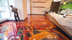 Epoxy flooring is a very durable, reliable, and affordable flooring system that can last for decades before showing any signs of wear and tear. Learn To Install Metallic Epoxy Orange Gold Wine Red Youtube