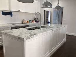 This kitchen is a bit smaller the grey cabinet, golden hardware, and pops of wooden texture make this a really interesting spot to be. China White Marble Countertop For Kitchen Cabinets Bathroom Vanitytop Workbench Table Top Solid Surface China Kitchen Countertop Kitchen Top