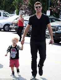 Robin thicke was born on march 10, 1977 in los angeles, california, usa as robin charles thicke. Robin Thicke Takes His Young Son Julian Shopping The Day After His Show Stopping Bet Awards Performance Daily Mail Online